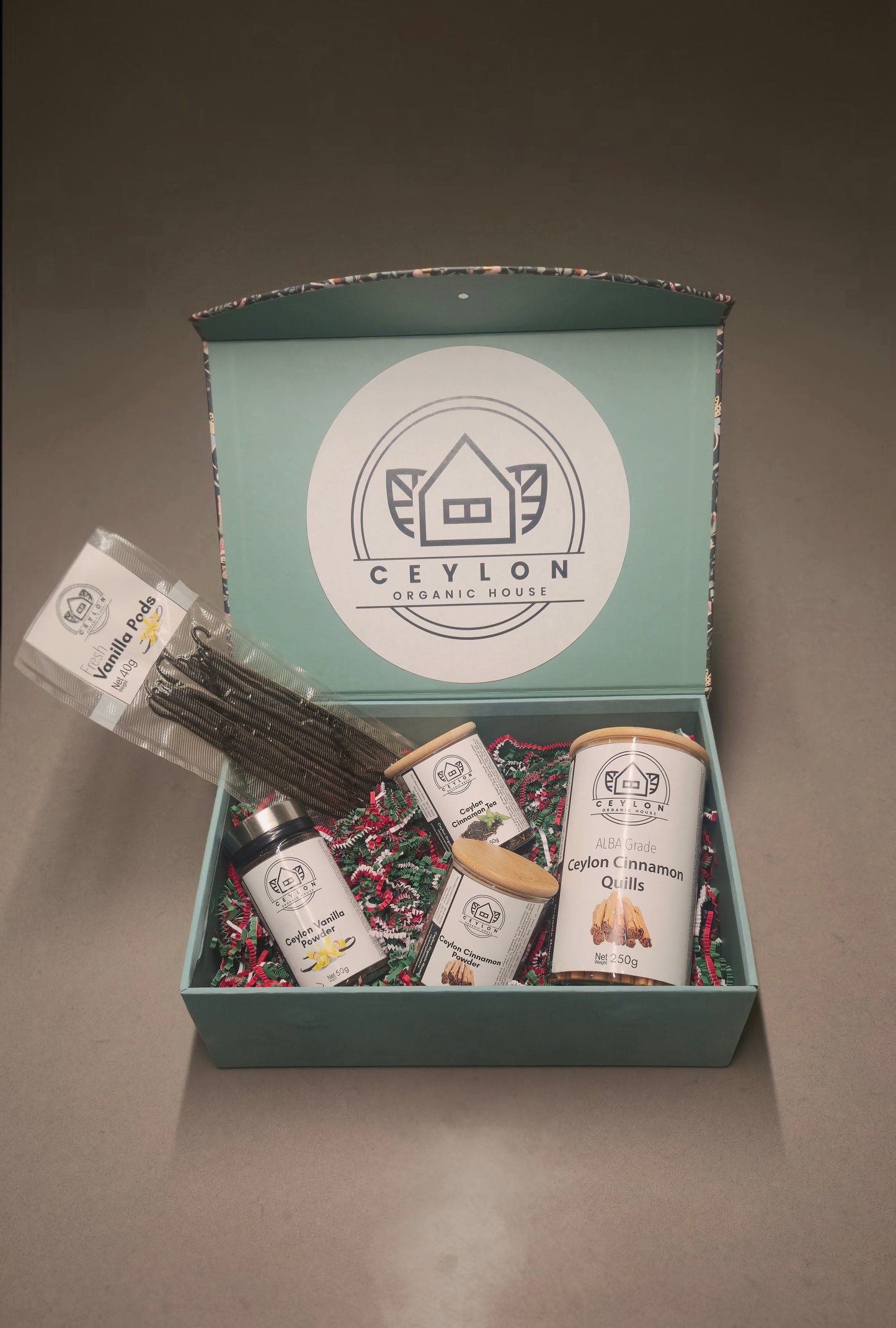 Ceylon Organic House gift set with vanilla beans, cinnamon, and tea.
