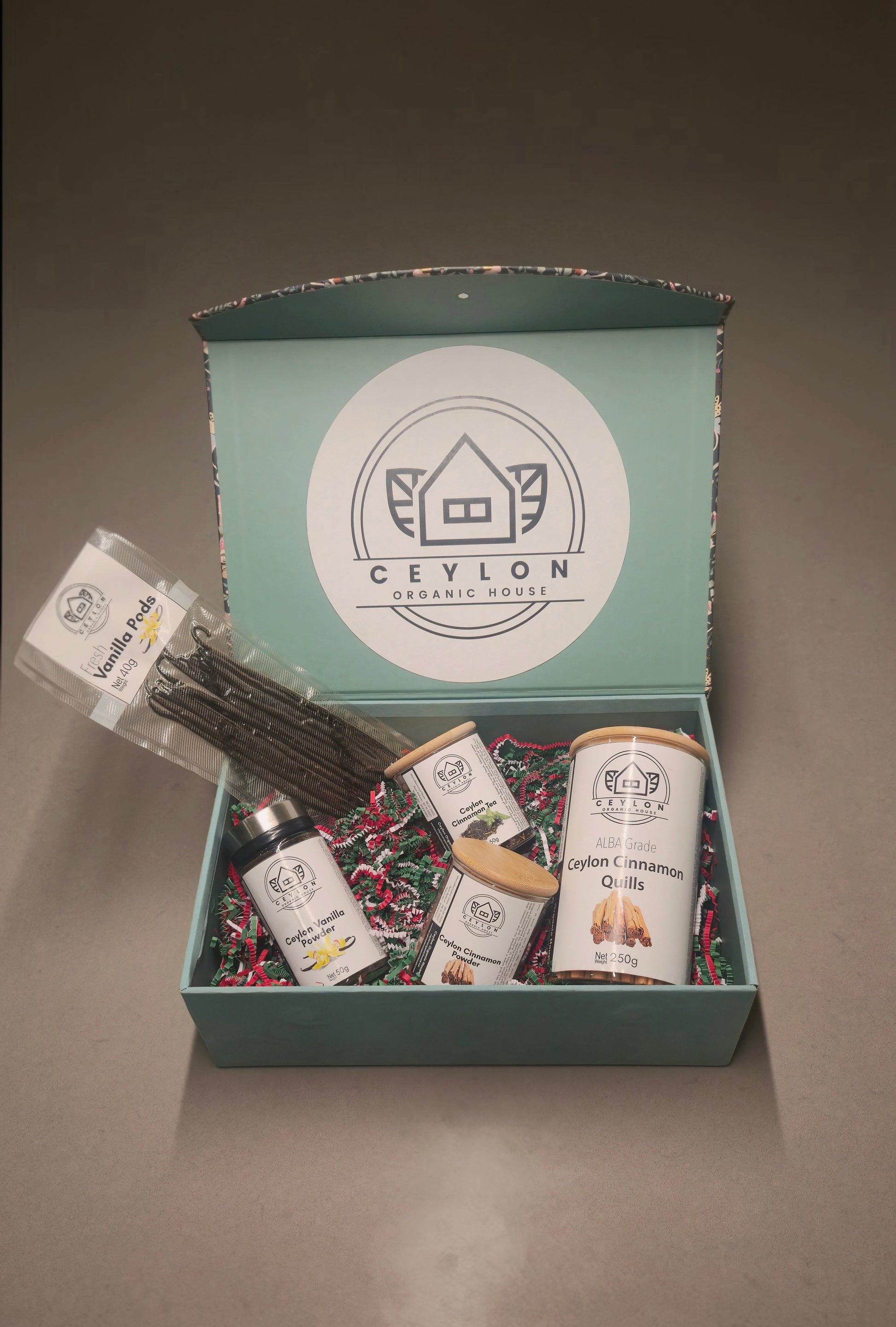 Ceylon Organic House gift set with vanilla beans, cinnamon, and tea.